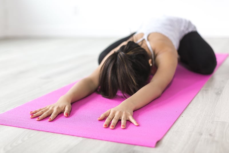 Woman practicing core strength exercises